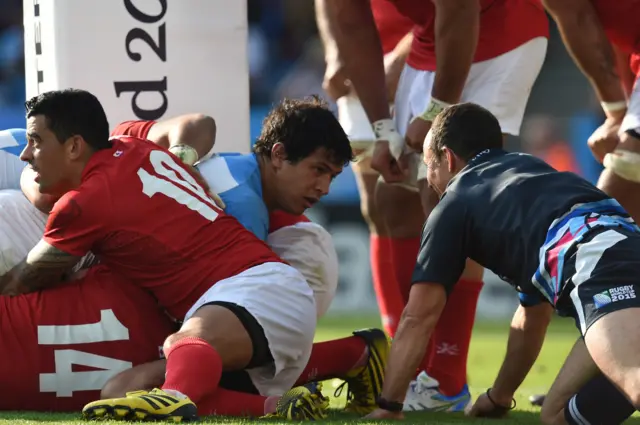 Referee Jaco Peyper looks before reviewing a try decision