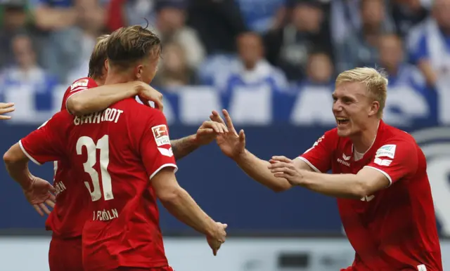 Cologne celebrate their victory against Schalke