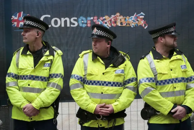 Police officers outside the Conservative conference in Manchester