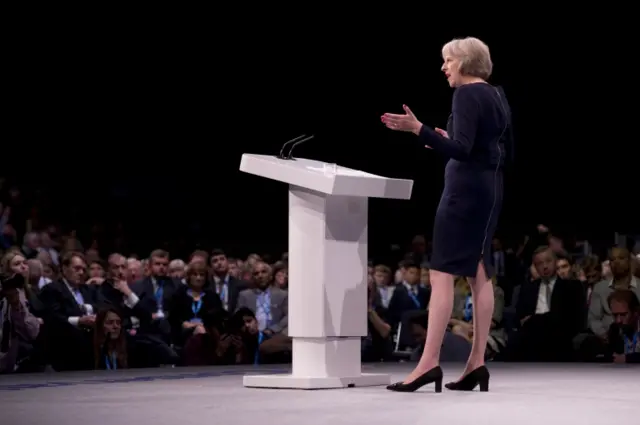 Theresa May speaking to the Conservative conference