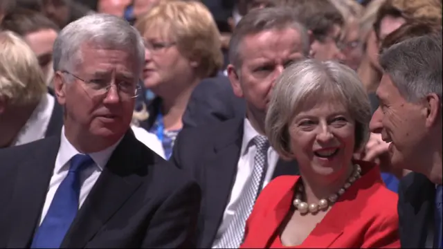 Michael Fallon, Theresa May and Philip Hammond in conversation