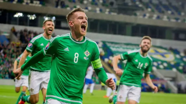 Steven Davis celebrates