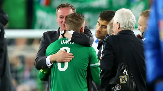 Michael O'Neill congratulates Steven Davis