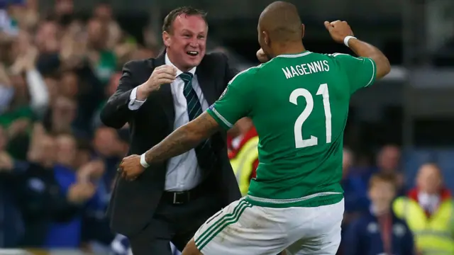 Josh Magennis celebrates