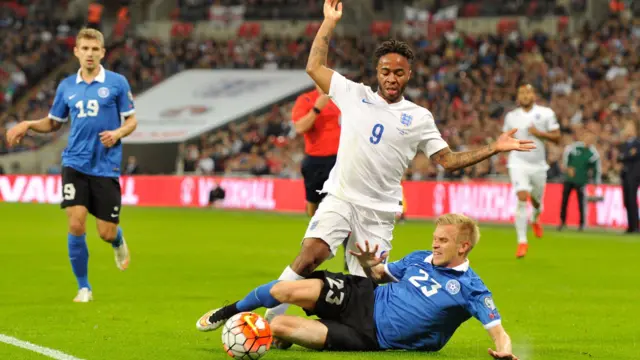 Raheem Sterling is tackled