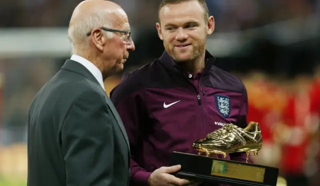 Wayne Rooney receives his reward