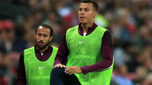 Dele Alli and Andros Townsend warm up