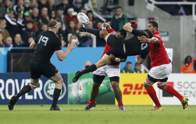 Paula Ngauamo performs an illegal tackle on Dan Carter