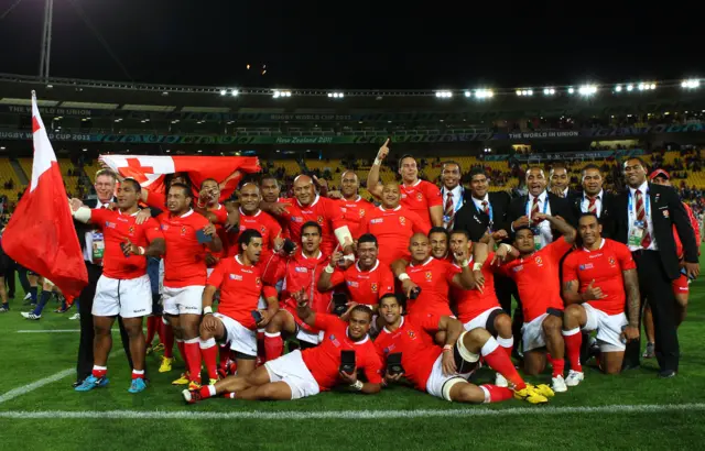 Tonga celebrate their 2011 win over France