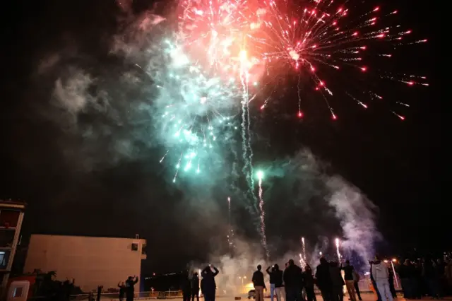 Supporters of Turkey"s President Recep Tayyip Erdogan and The Justice and Development Party, (AKP), fire fireworks as they celebrate outside the AKP headquarters, in Istanbul, on 1 November 2015