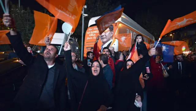 Supporters of Justice and Development Party (AKP) celebrate after hearing the early results of the general elections in front of the party's office in Istanbul, Turkey, 1 November 2015