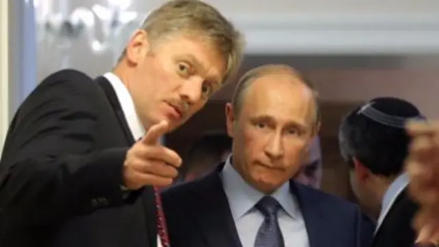 Dmitry Peskov and Vladimir Putin