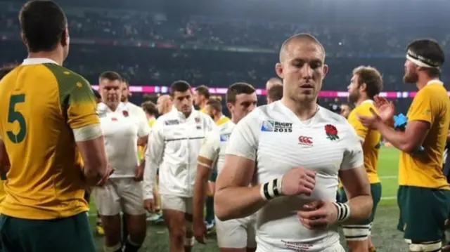 Mike Brown walks off after England's defeat to Australia