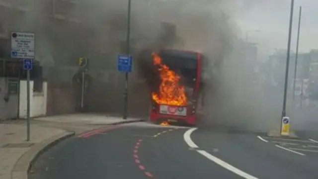 Bus with flames coming from back