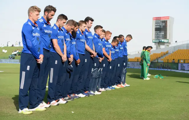 England cricketers stand silent for Remembrance Day