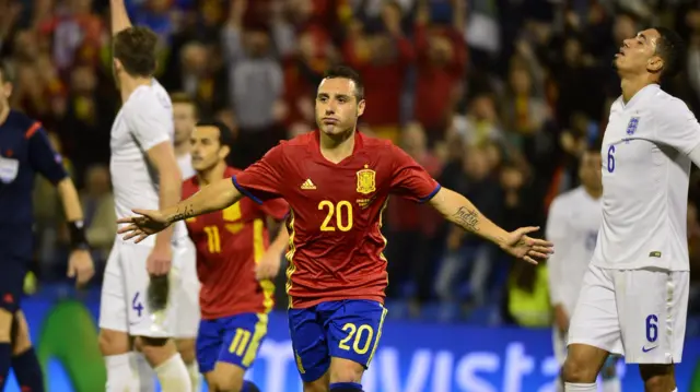 Santi Cazorla celebrates