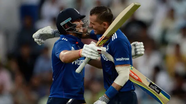 Alex Hales of England celebrates with Joe Root