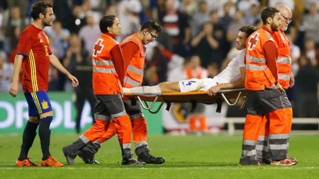 Michael Carrick is carried off