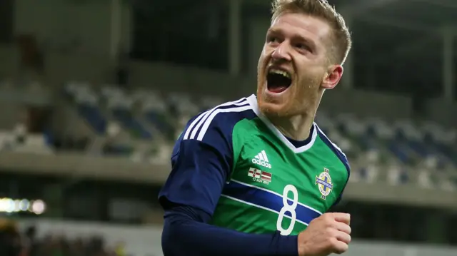 Steven Davis celebrates