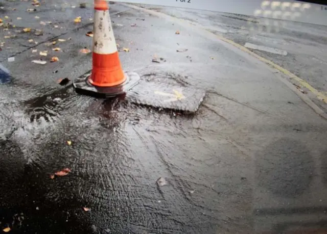 Flooded street in Mirfield