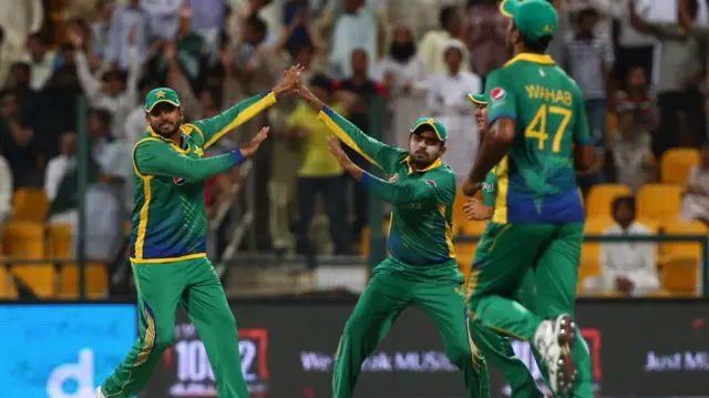 Pakistan"s players celebrate