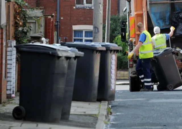 Bins being emptied in Leeds