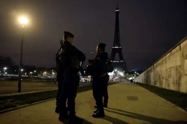 French police patrol the Eiffel Tower after the Paris attacks