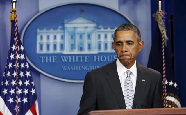 President Obama speaks to reporters at the White House following the attacks in Paris