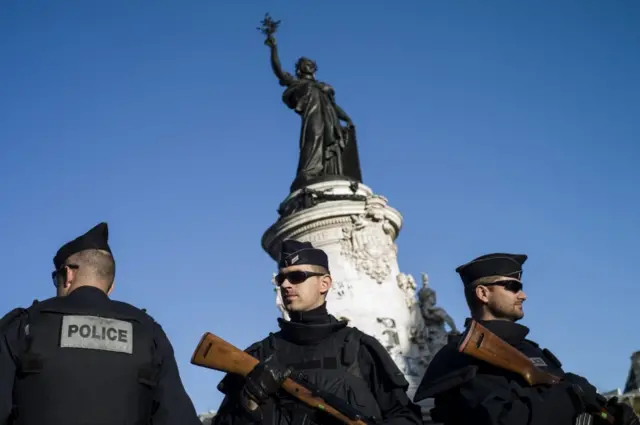 Police guard the Place de la Republique in Paris