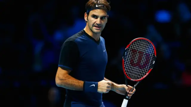 Roger Federer fist pumps