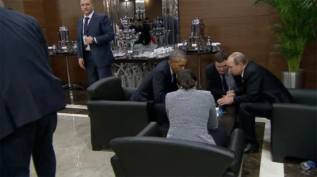 Barack Obama and Vladimir Putin chat at the G20 summit