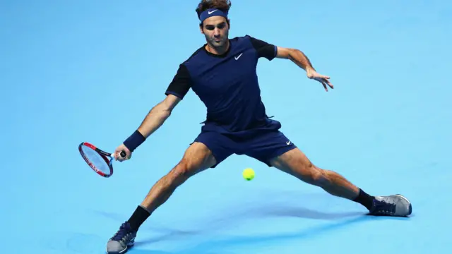 Roger Federer hits a forehand