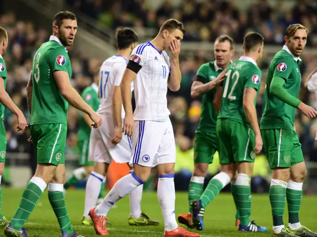 Edin Dzeko reacts to a missed chance for Bosnia