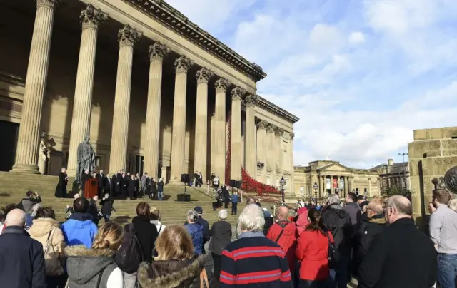 People observe one-minute silence in Liverpool