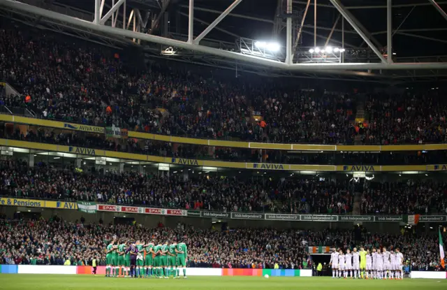 A minute's silence is being observed before the game for the victims of the Paris attacks.