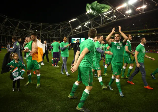 The Irish players celebrate qualification