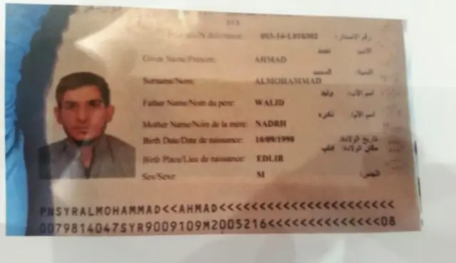 Photograph purportedly showing passport of Ahmad Al Mohammad, which was found beside one of the suicide bombers in Paris