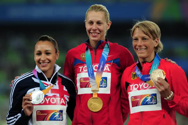 Jessica Ennis-Hill (left) on the podium at Daegu 2011