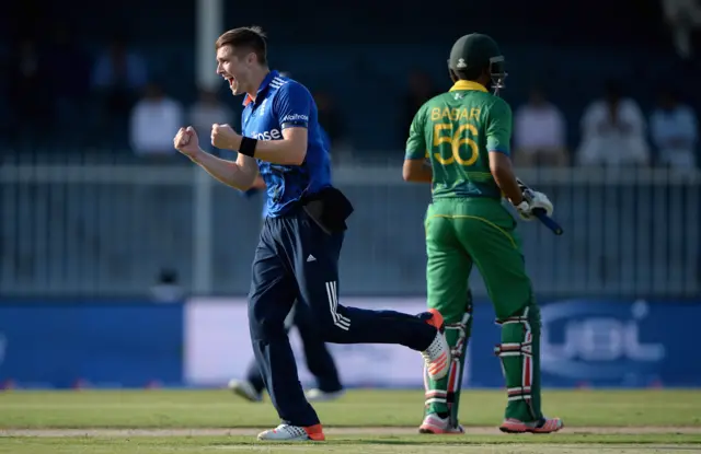 Chris Woakes of England celebrates