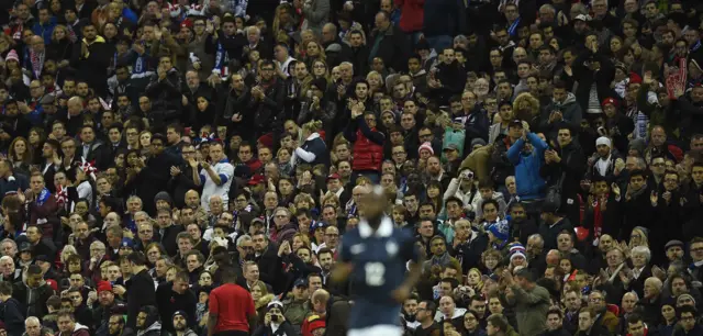 Lassana Diarra is applauded by the Wembley crowd