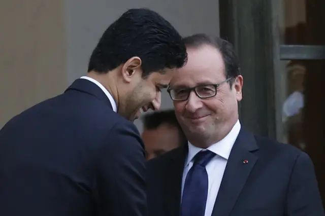 French President Francois Hollande greets Paris Saint-Germain's Qatari president Nasser Al-Khelaifi after a meeting with Qatar's Prime Minister Sheikh Abdullah bin Nasser bin Khalifa Al Thani at the Elysee Palace