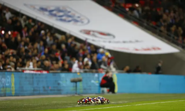 Floral tributes laid by both sides at Wembley