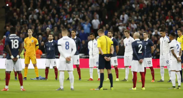 England and France line-up in the centre circle