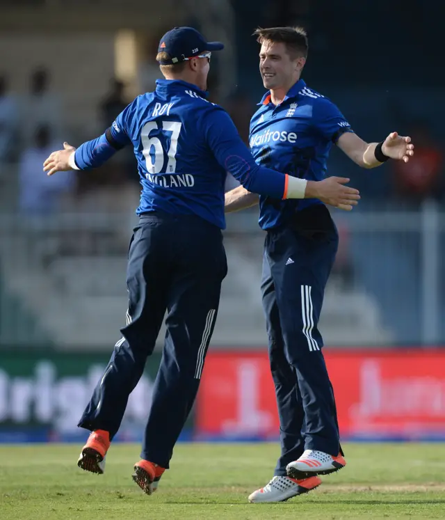 Chris Woakes of England celebrates