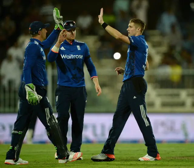 Chris Woakes of England celebrates