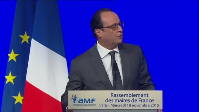 President Francois Hollande addresses French mayors in Paris