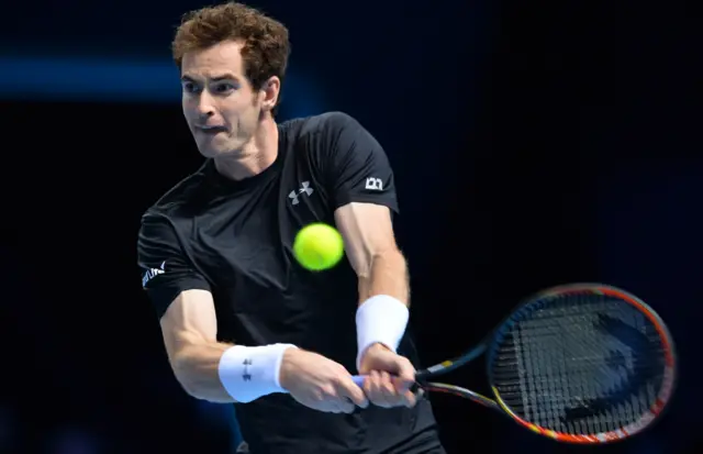 Andy Murray returns with a backhand