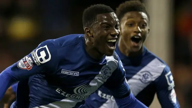 Birmingham City winger Viv Solomon-Otabor celebrates his first senior goal for the club with team-mate Demarai Gray