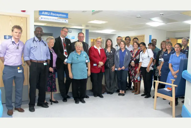 Dame Julie Moore (seventh from left), chief executive of Good Hope Hospital, visits the Acute medical Unit team at the opening of the new £3.2million unit