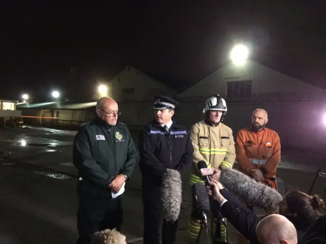 Emergency services at a press conference